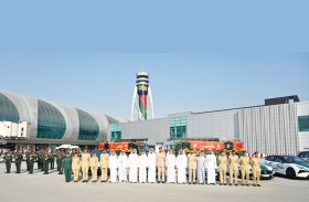 برج المراقبة بمطار دبي الدولي يتوشّح بعلم الإمارات احتفاءً بروح الوطن